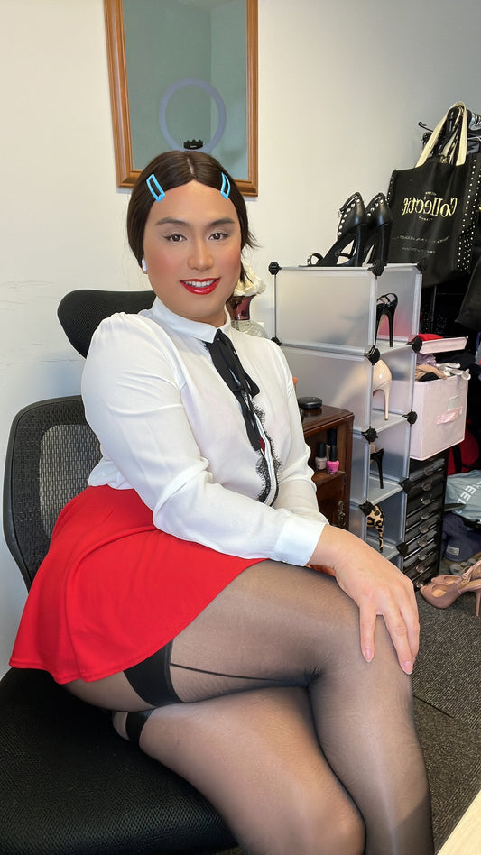 White sheer blouse and red skirt